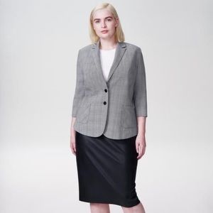 Beautiful new with tags US blazer. Discontinued plaid color.
